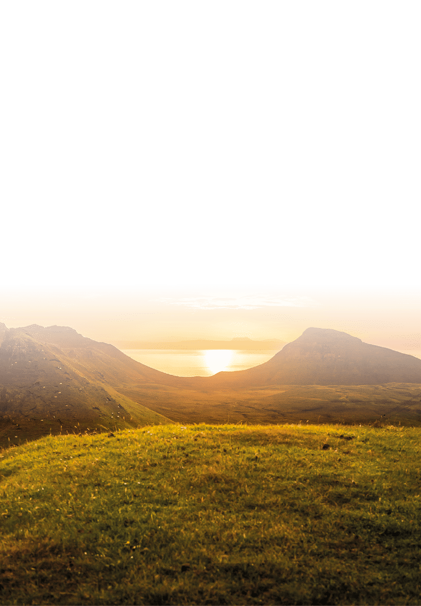 Dome tent illuminated by the warm glow of sunrise as a golden cloudscape reveals the dramatic mountain pinnacles of this panoramic landscape. ProPhoto RGB profile for maximum color fidelity and gamut.