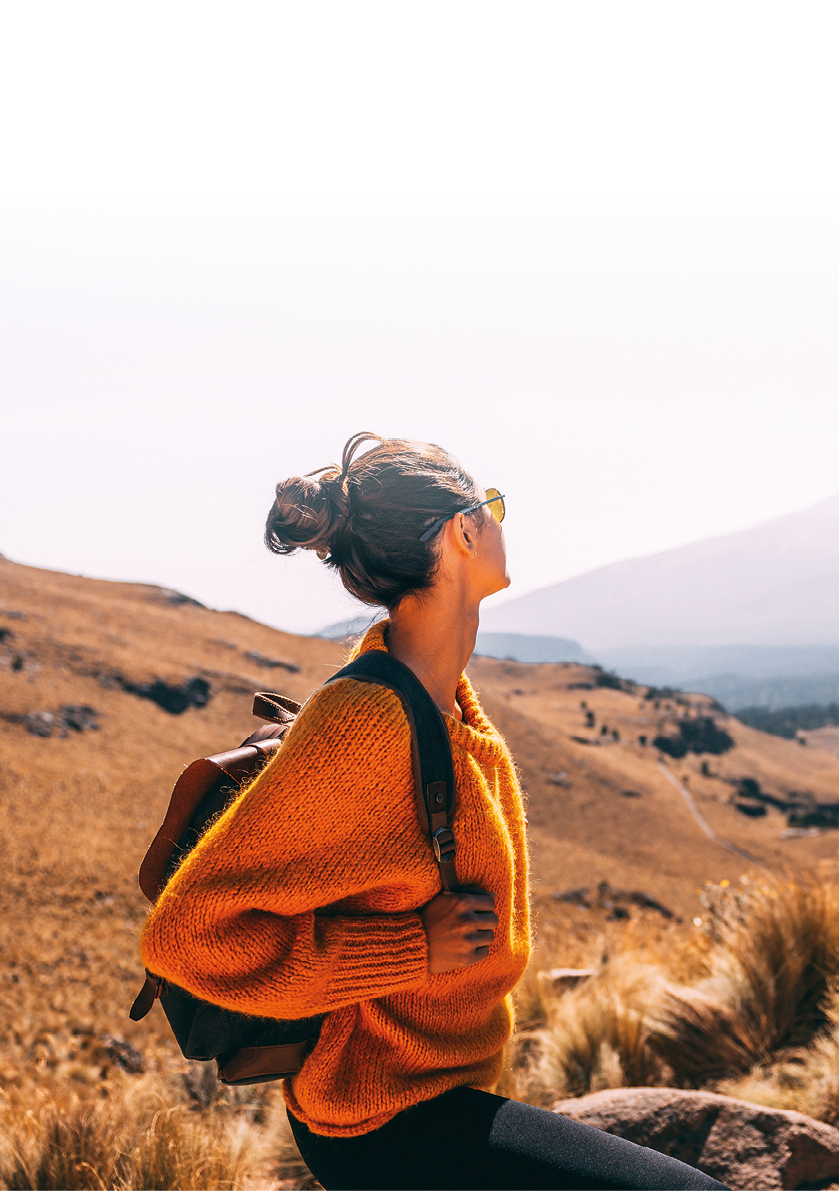 Young Latin woman enjoying the view to Popocatepetl volcano