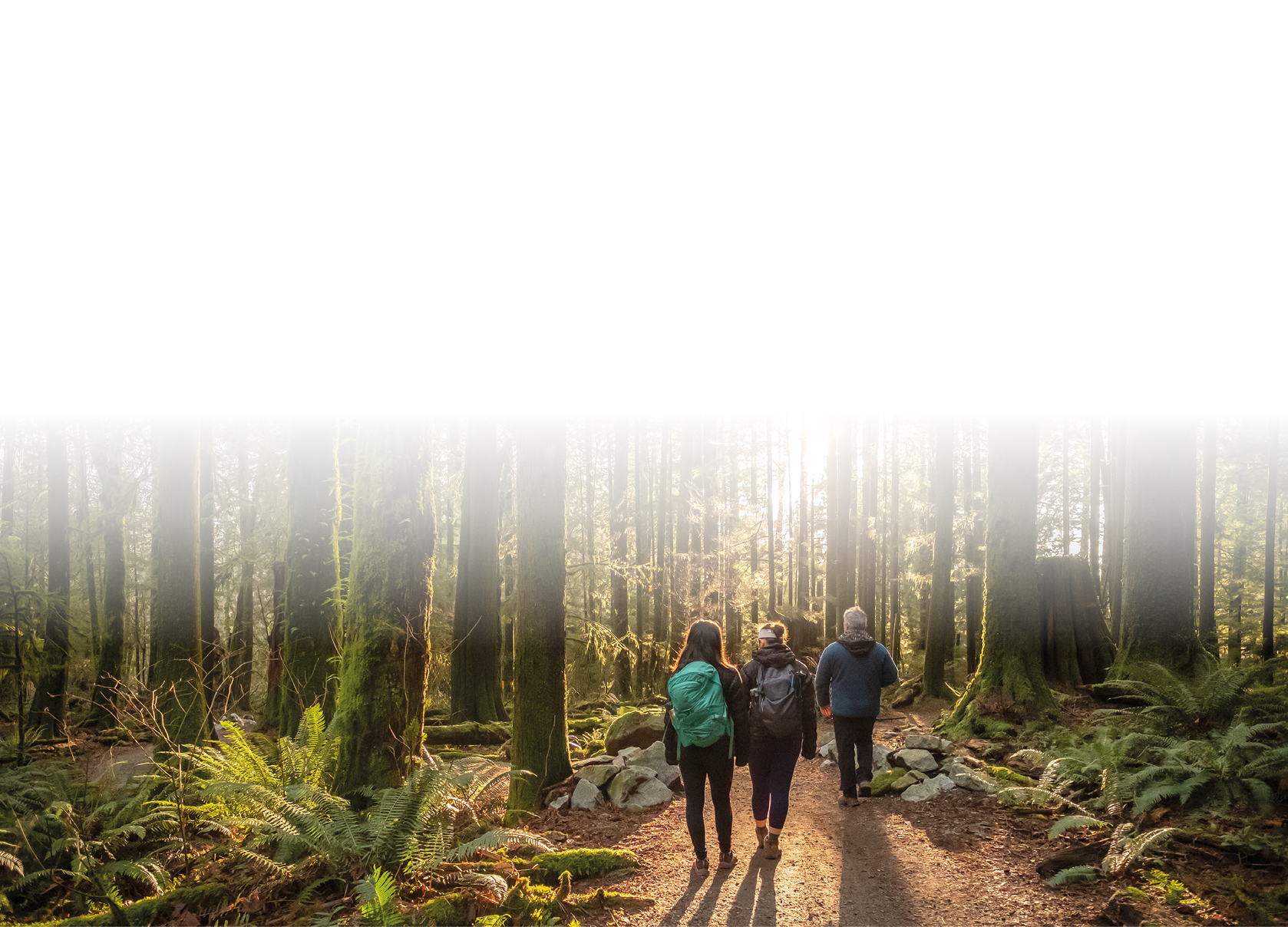 Mature father and Eurasian daughters hiking in Mt  Seymour Provincial Park, North Vancouver, British Columbia, Canada