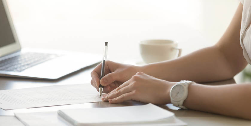 Close up photo of womans hands with pen signs contract  Businesswoman puts her personal signature on business agreement  Female entrepreneur working with business documents  Paperwork in office